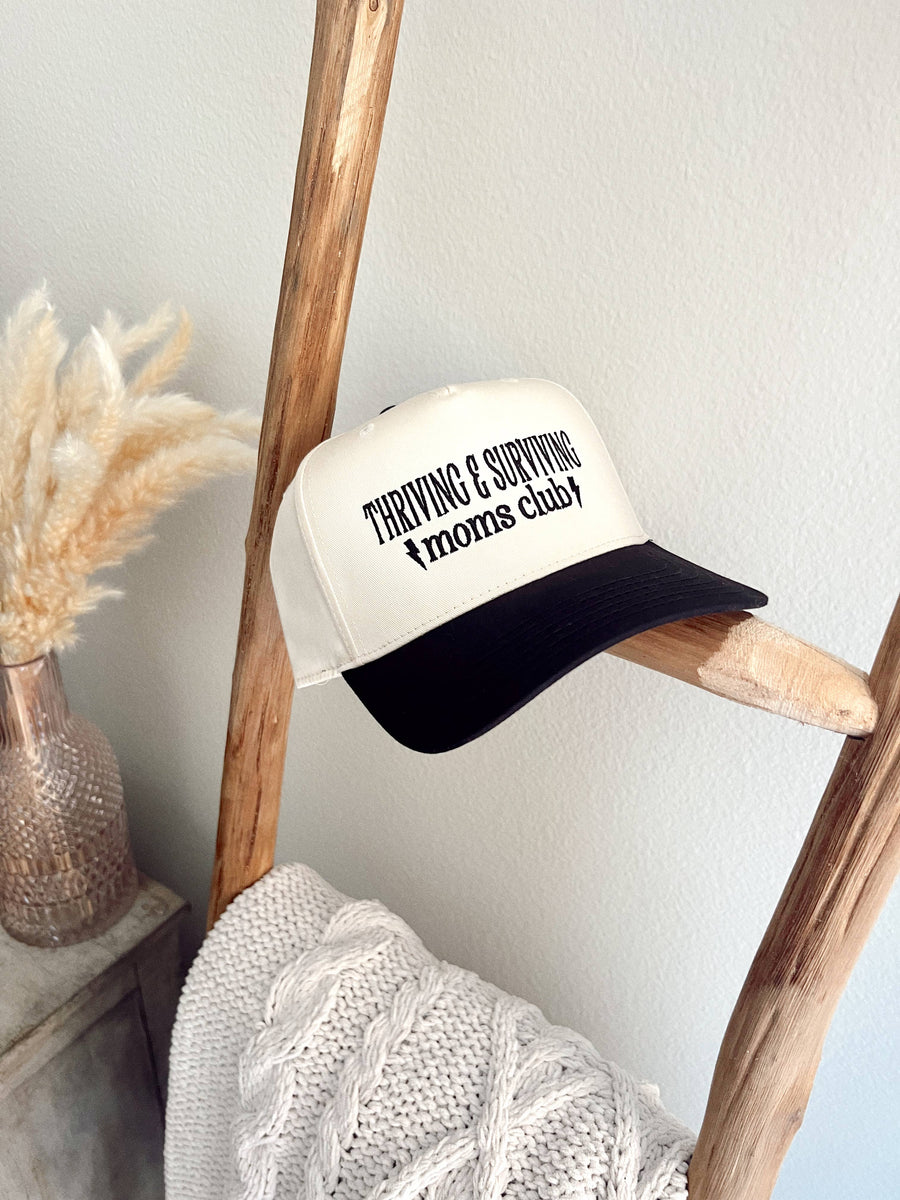 Thriving & Surviving Moms Club Trucker Hat in Cream/Black.